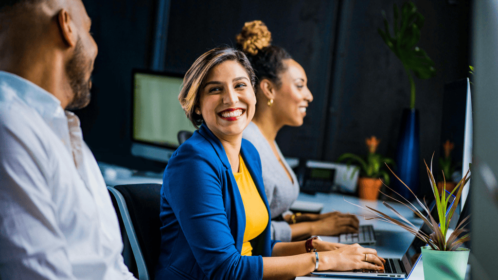 Woman smiles after seeing video for health benefits